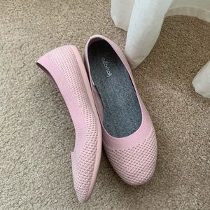 Pink Allbirds flats
